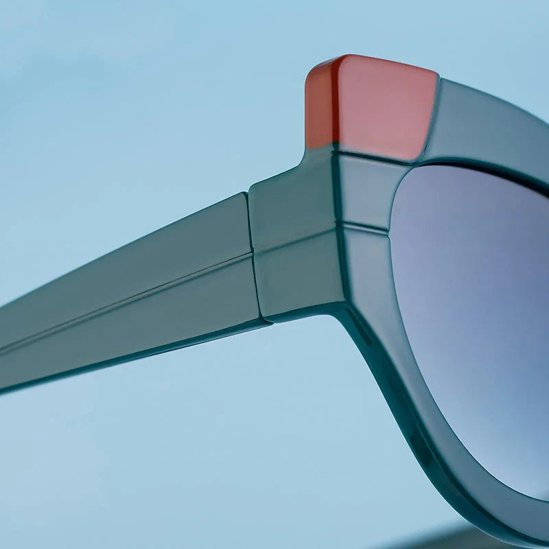 Iconic Cat Eye Retro Punk Sunglasses in black and gray, offering vintage charm and modern edge with UV400 protection