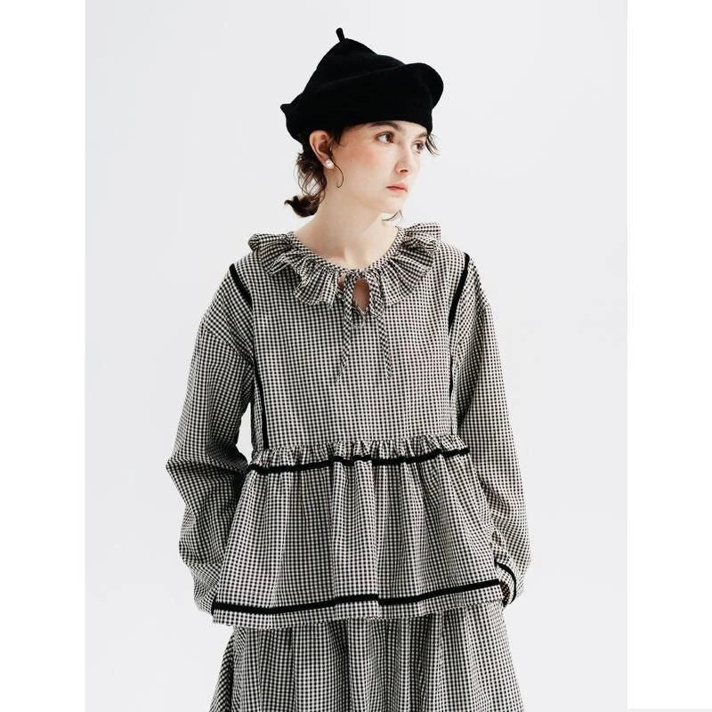 Autumn Elegance Checkered Shirt with Doll Collar, a stylish long-sleeved shirt in a classic black and white checkered pattern