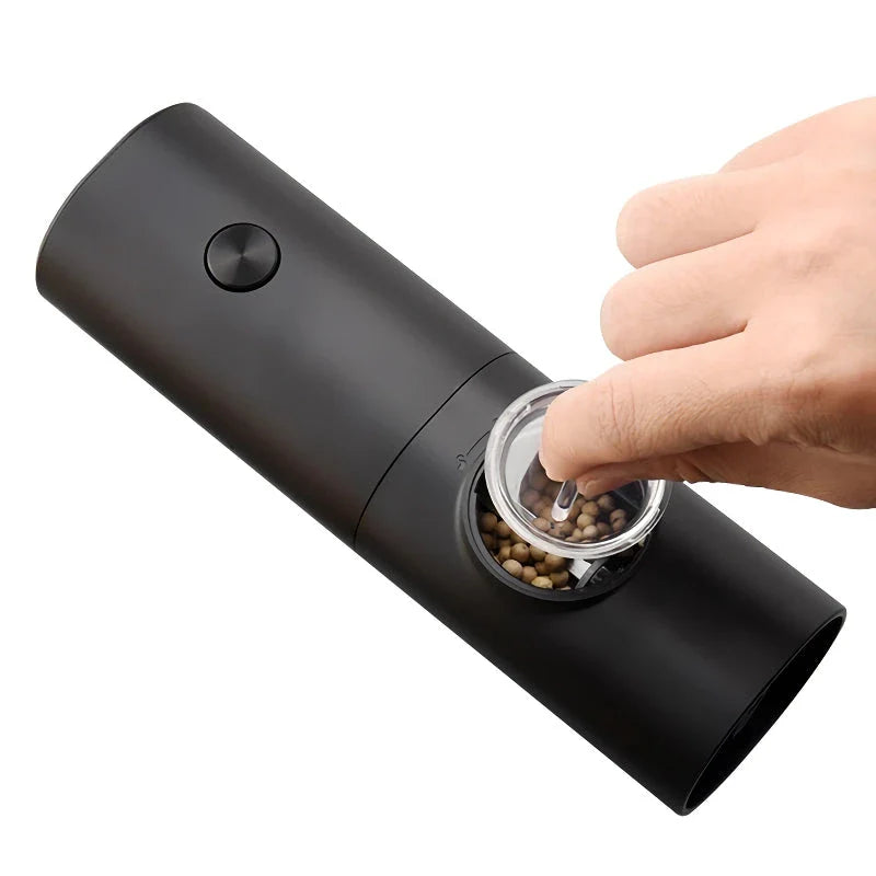 Premium compact electric spice grinder with adjustable coarseness settings, automatic operation, and durable construction for home and travel use