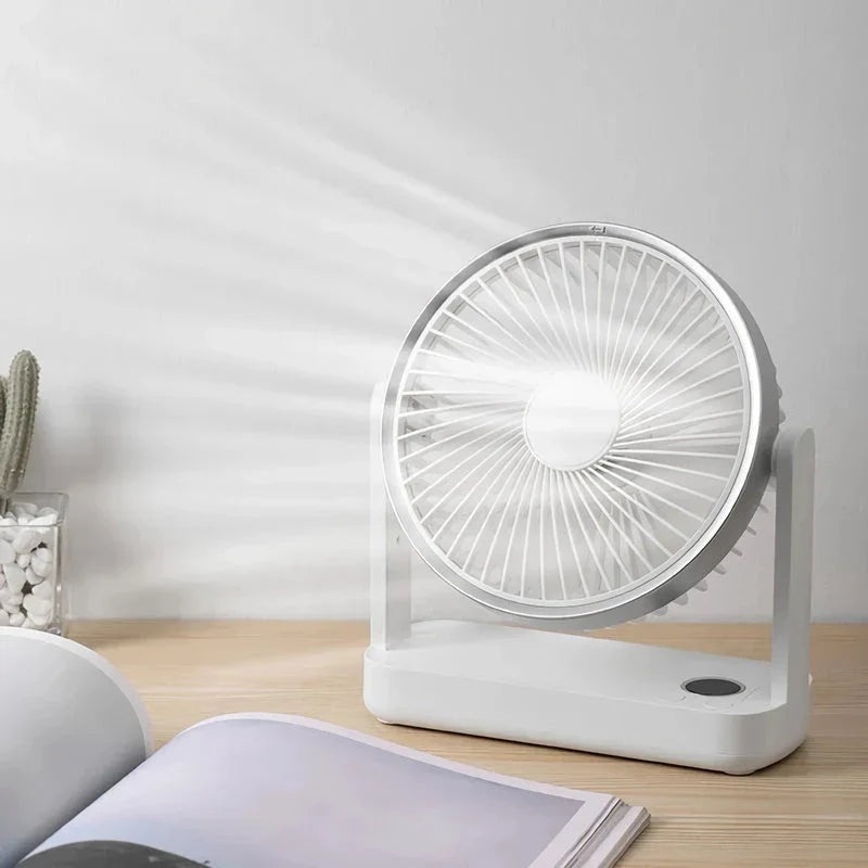 A compact, rechargeable USB desk fan with adjustable speed settings and a tilting head for targeted airflow.