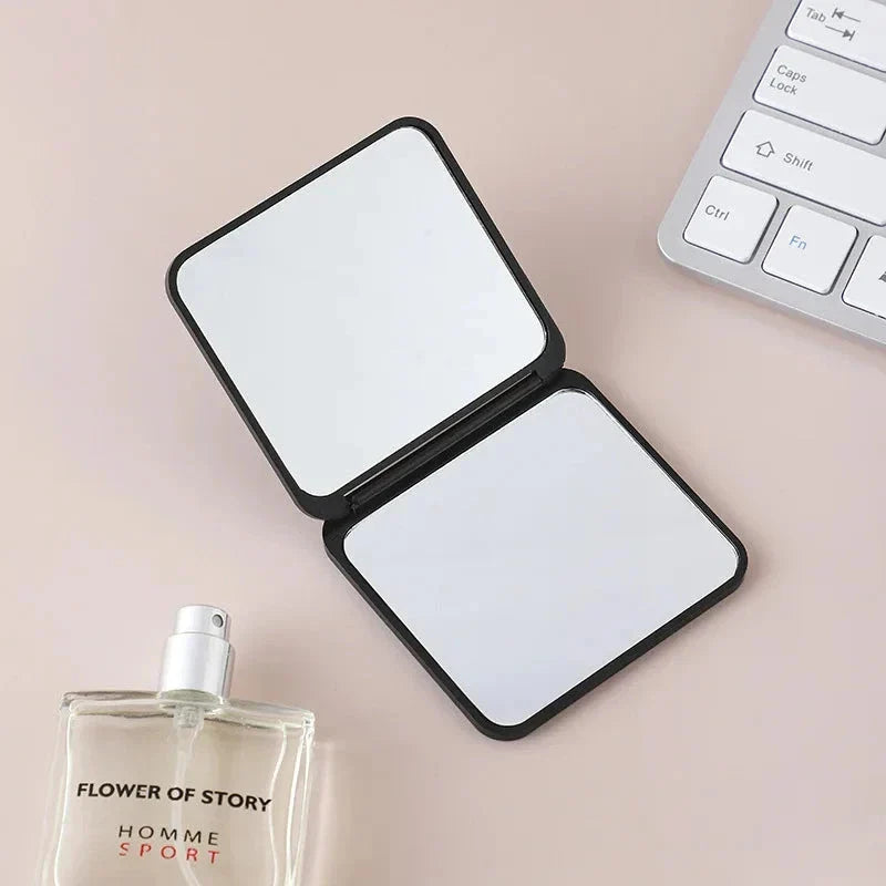 Portable Folding Double-Sided Makeup Mirror in Blue, Pink, Black, and Silver Colours