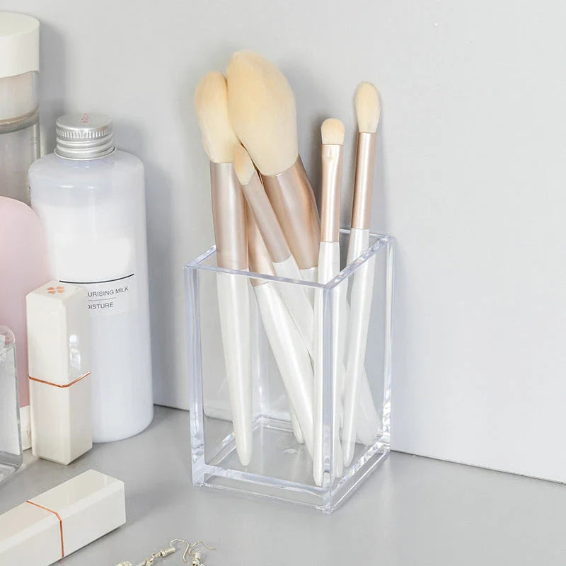 Stylish makeup brush holder with clear acrylic display rack for neatly organising cosmetics and beauty essentials