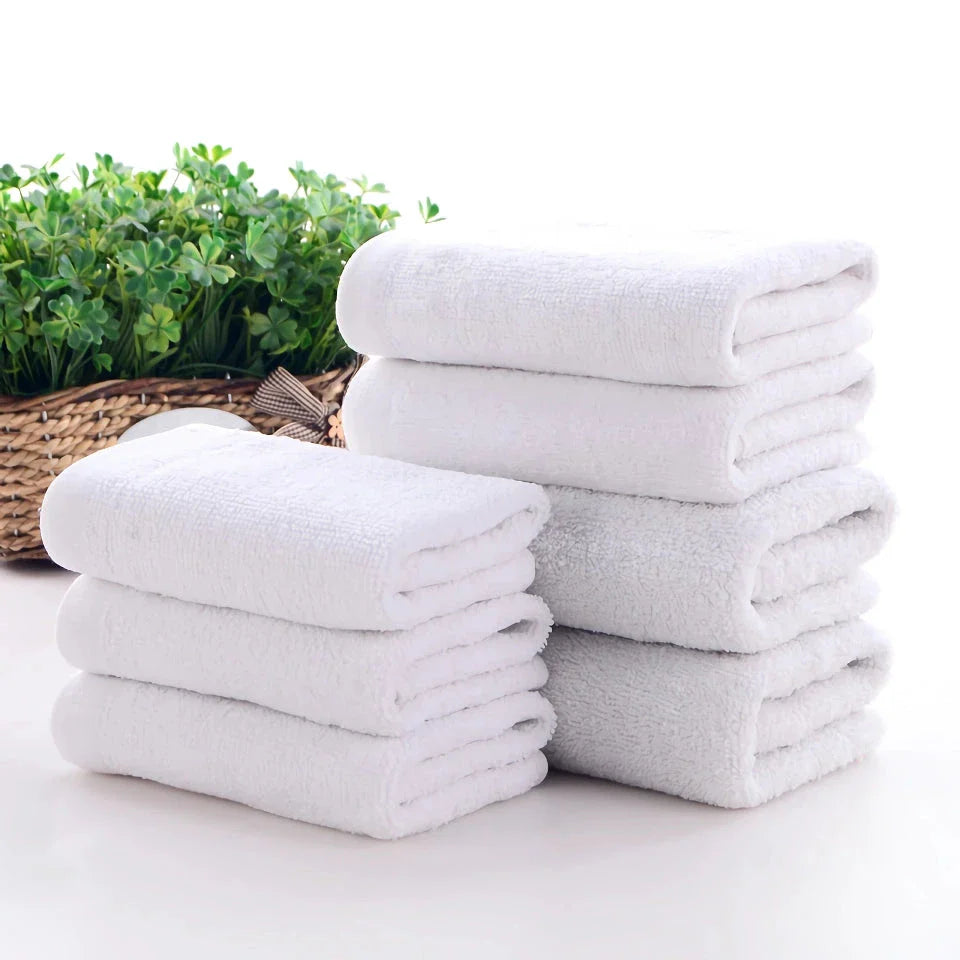 Premium British cotton hand towels in a pack of 10, offering superior softness, absorbency, and durability for various household and commercial uses.