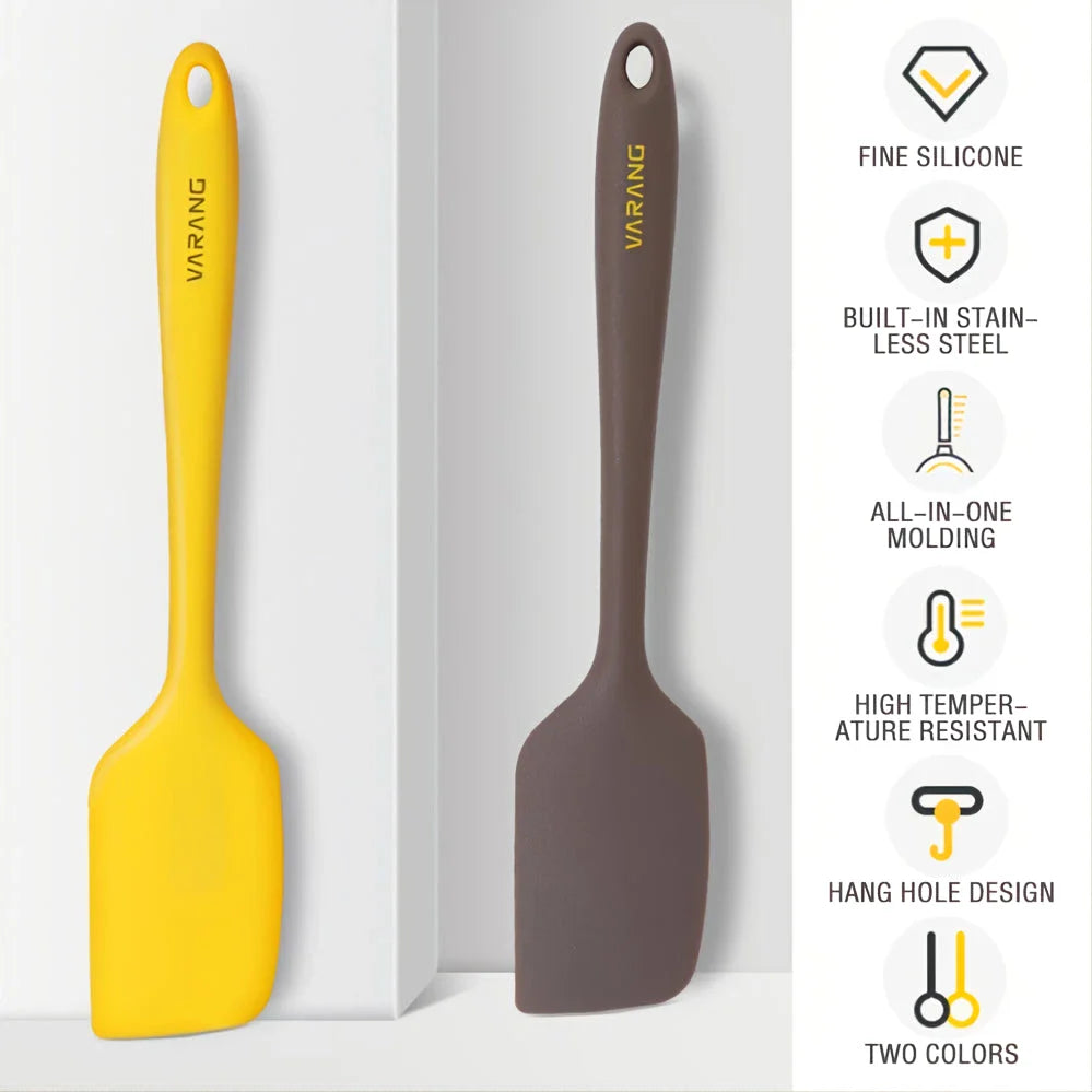 A set of two high-quality silicone spatulas in brown and yellow colours, designed for versatile cooking and baking tasks.