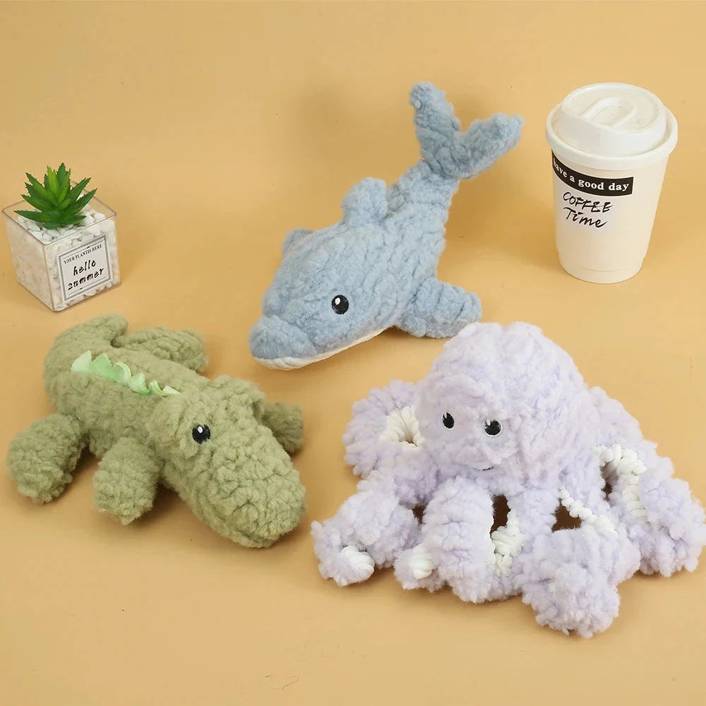 Plush crocodile-shaped squeaky dog toy made of durable, bite-resistant fleece material