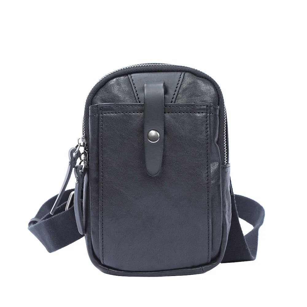 Timeless Leather One-Shoulder Crossbody Bag in Black, featuring premium British cowhide, hands-free design, and organised interior pockets