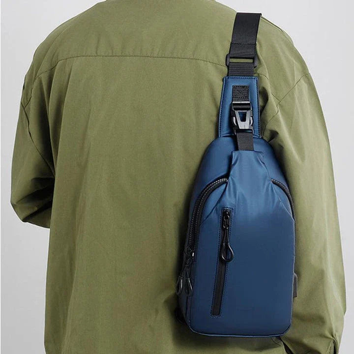 Versatile blue sling crossbody backpack for men with adjustable strap and spacious interior