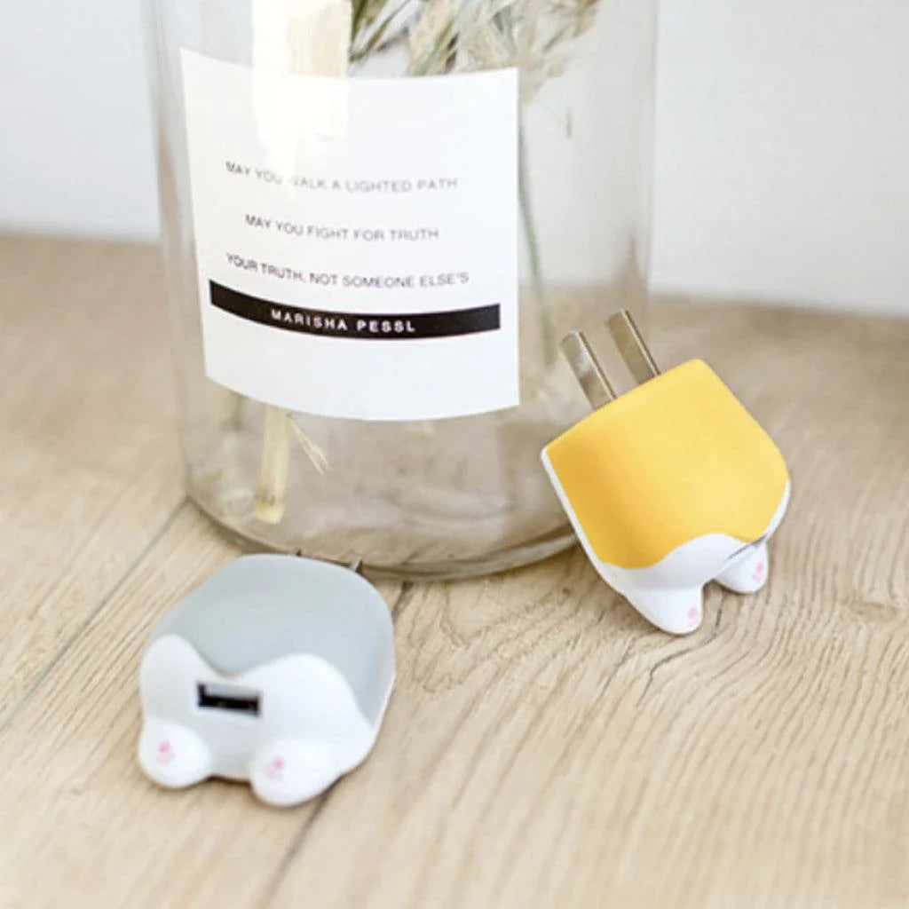 Cheeky Corgi USB Charger: A whimsical, British-inspired device that celebrates your love for corgis while keeping your tech powered up on the go.