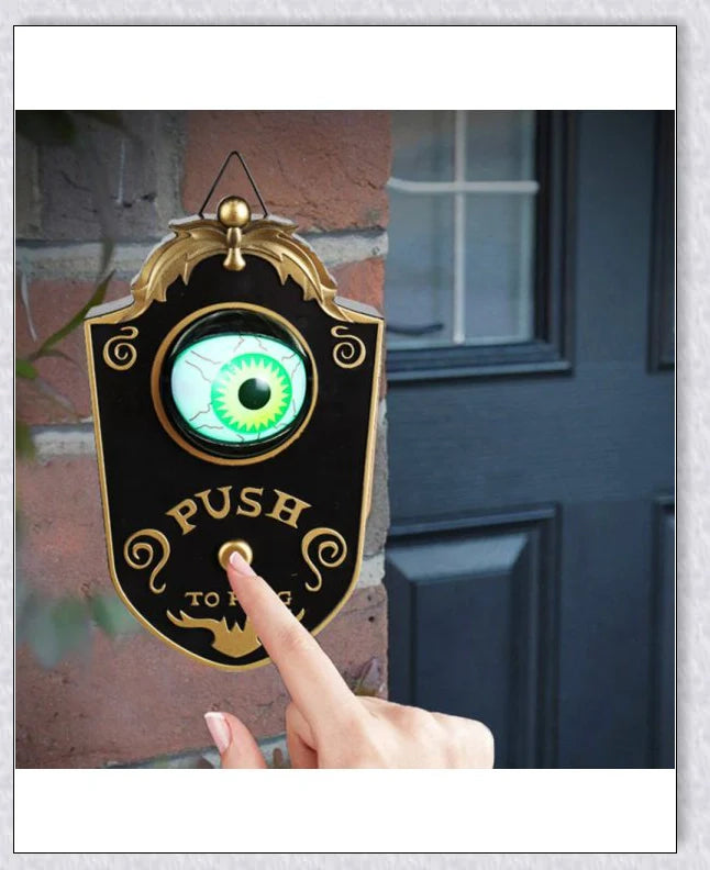 Spooky animated Halloween doorbell with a lifelike glowing green eyeball that peers out and greets guests