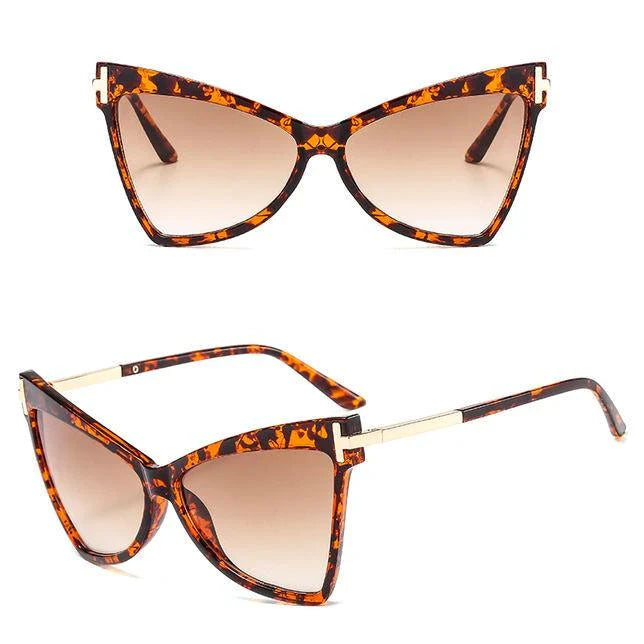 Vintage-inspired cat-eye sunglasses with vibrant colour lenses and 100% UV protection