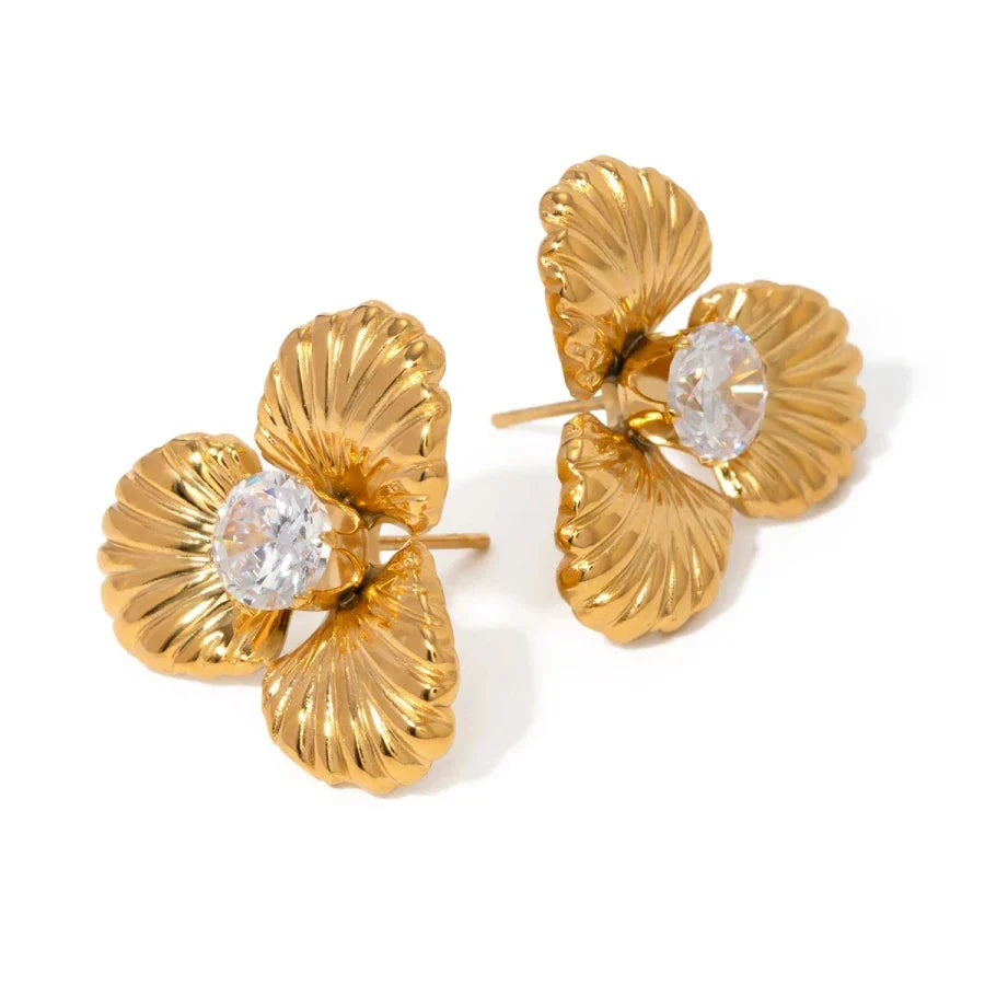 Elegant 18K gold-plated stainless steel flower stud earrings with sparkling zircon inlays, designed for timeless style and all-day comfort.