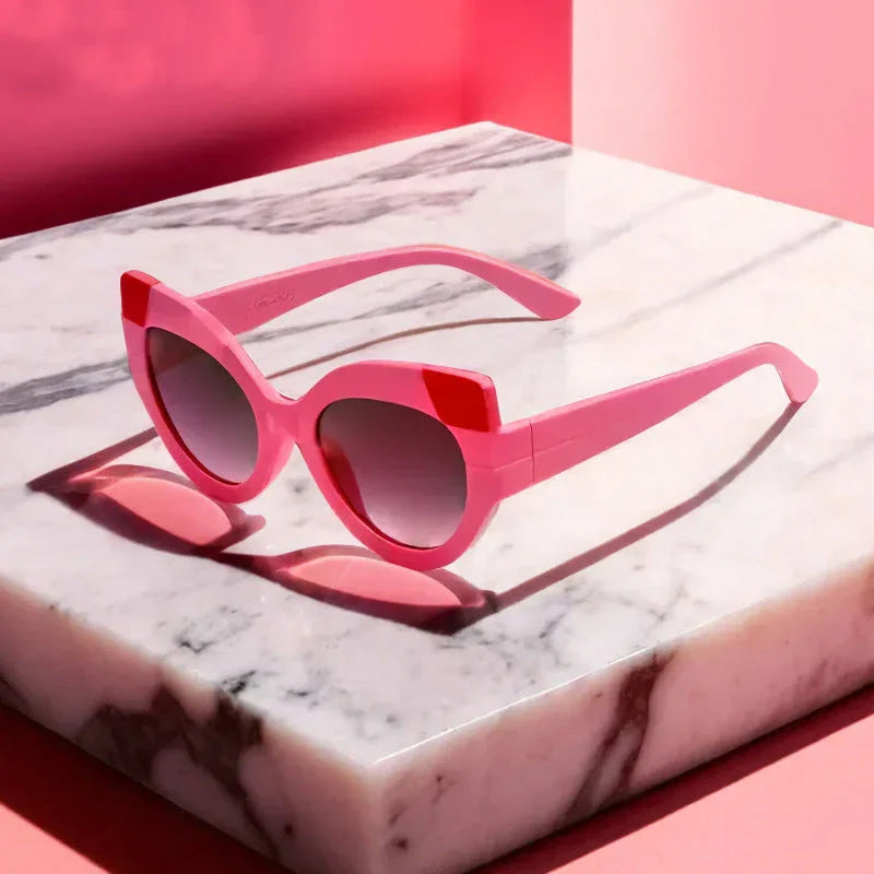 Iconic Cat Eye Retro Punk Sunglasses in black and gray, offering vintage charm and modern edge with UV400 protection