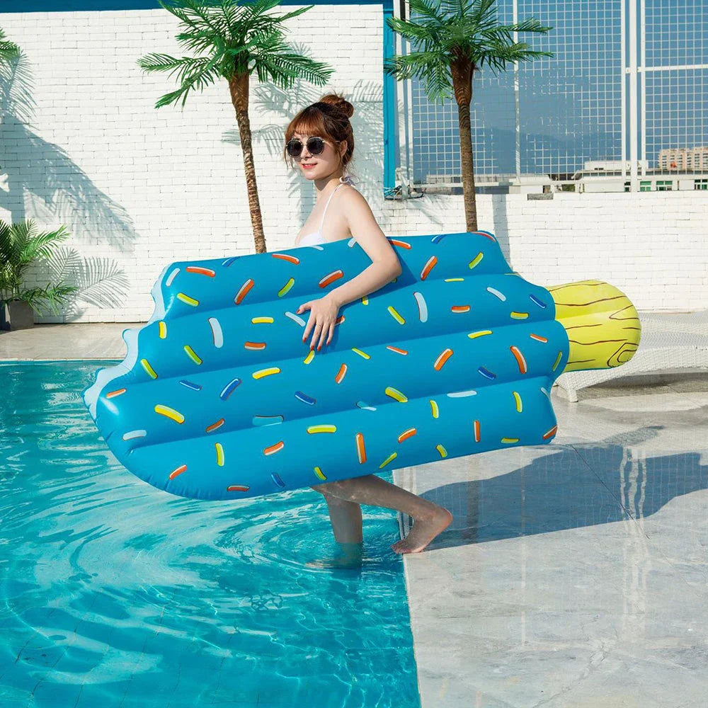 Premium inflatable swim float in a vibrant pink and blue ice cream design, providing comfortable and stylish relaxation on the water