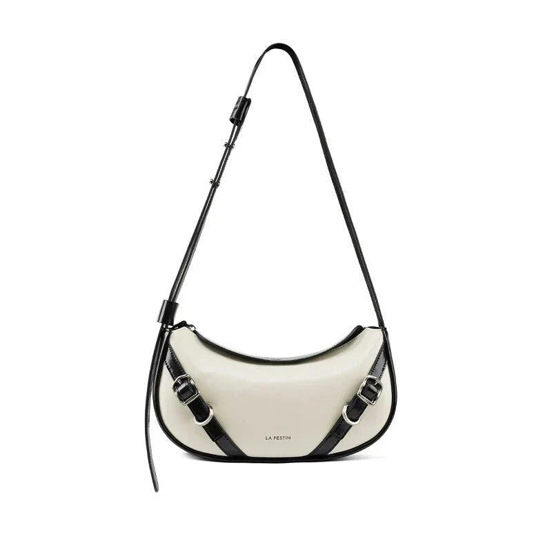 Elegant black shoulder and crossbody baguette bag made with premium split leather and synthetic lining
