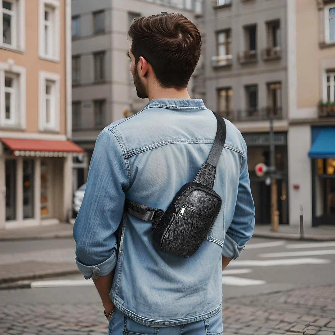 A premium genuine leather crossbody bag with an urban, minimalist design, perfect for everyday use and outdoor adventures.