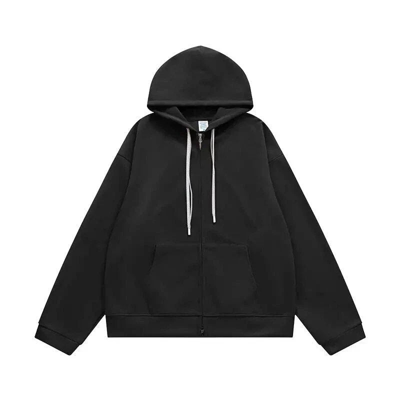 A premium British cotton and polyester hoodie jacket with a zip-up design, featuring a relaxed, oversized fit for everyday comfort and style.
