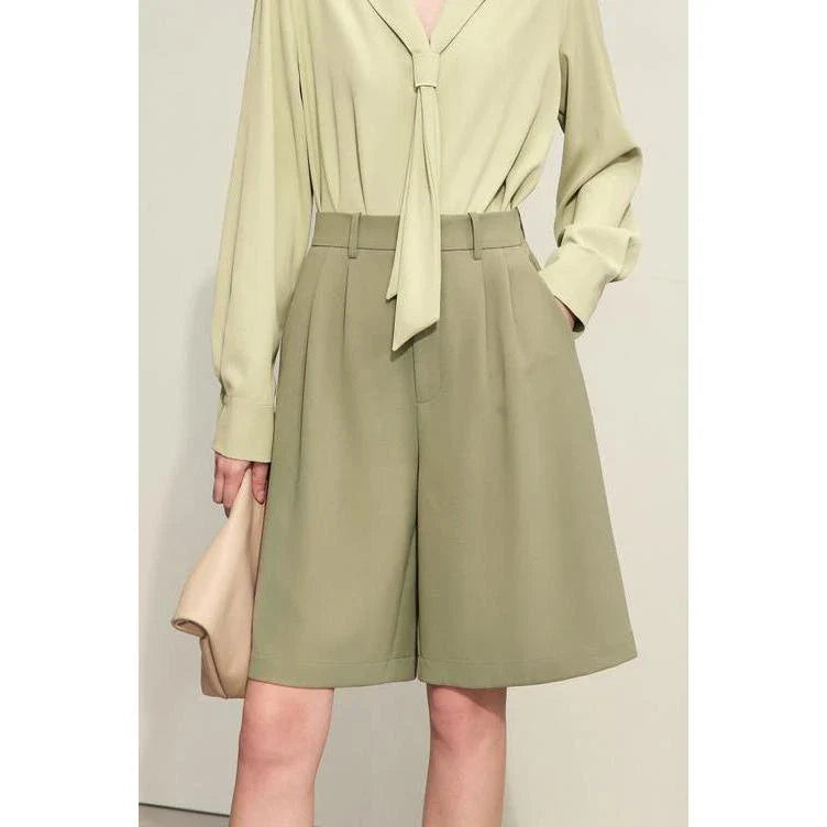 Elegant wide-leg shirred shorts for women, featuring a refined design and comfortable fit for the British summer