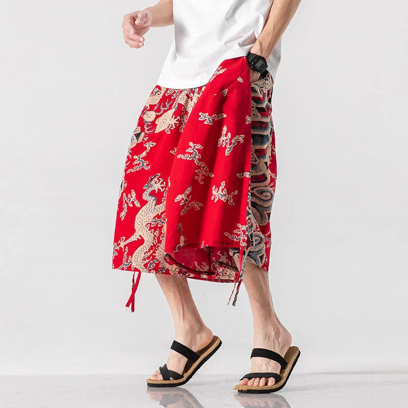 Men's loose-fitting Chinese-inspired cropped pants with a dragon or elephant floral pattern in navy blue, red, or coffee colours