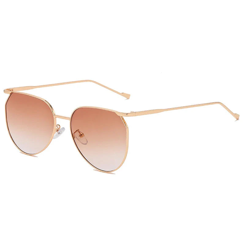 Elegant oval-shaped sunglasses with gradient lenses and alloy frames, offering timeless British style and UV protection.