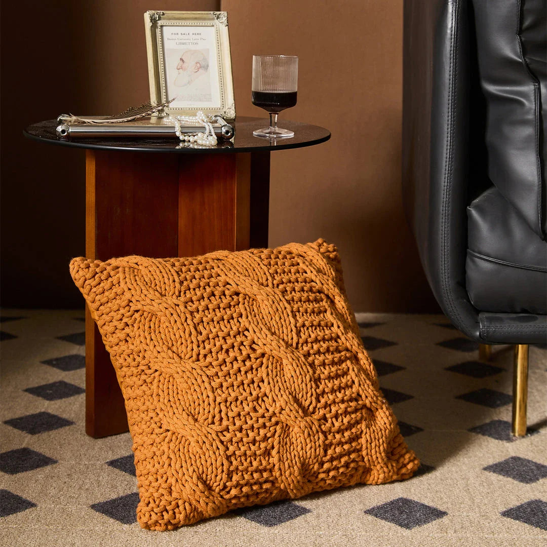 Luxurious hand-crocheted chunky knit throw pillow in a range of vibrant colours, providing cosy comfort and sophisticated style.