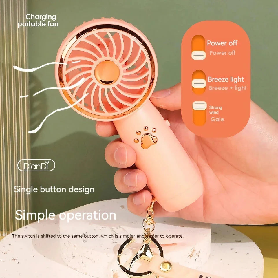 Compact, cartoon-themed USB handheld fan for keeping cool during the summer months