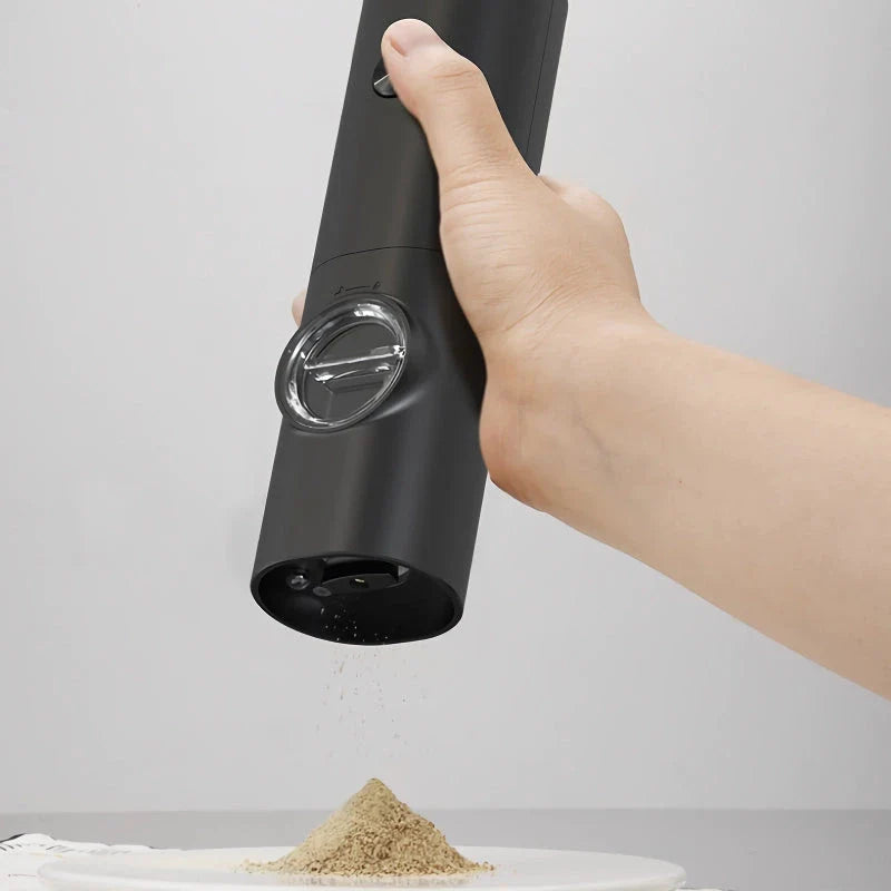Premium compact electric spice grinder with adjustable coarseness settings, automatic operation, and durable construction for home and travel use