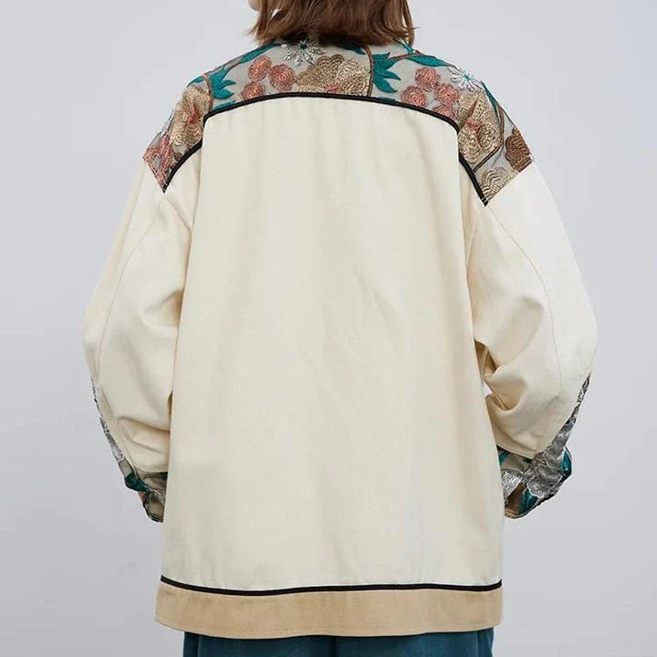 Trendy embroidered patchwork denim jacket in various sizes, perfect for autumn and winter wear