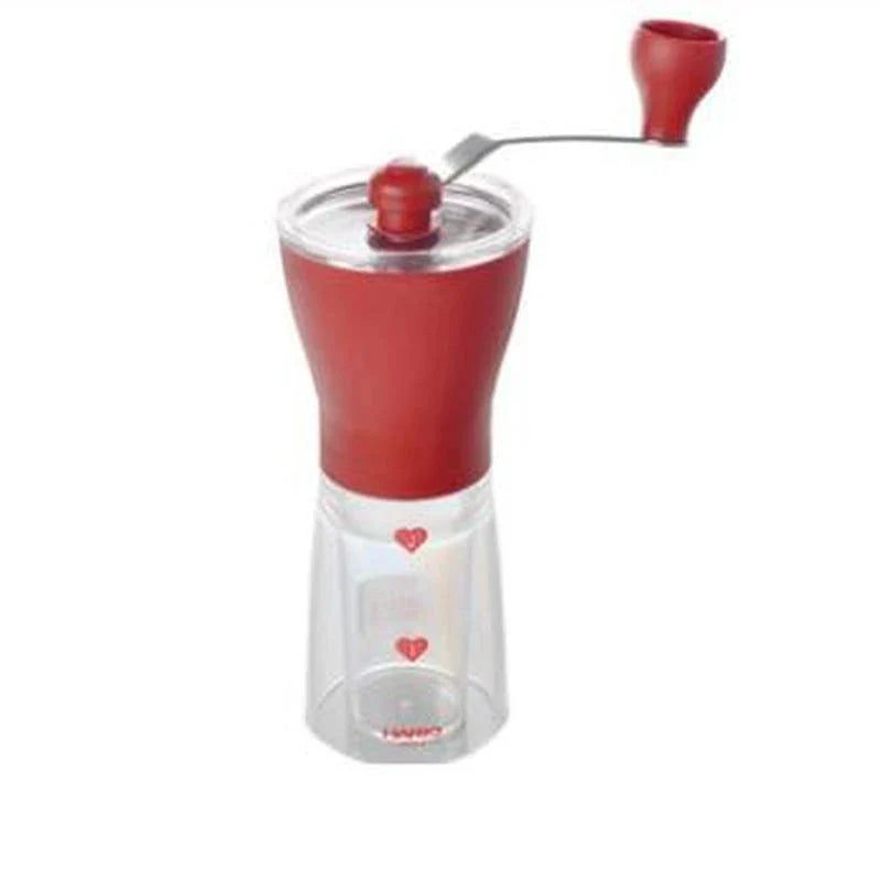 Stylish powder coffee grinder in black and red, with a manual grinding mechanism for consistent and freshly ground coffee.