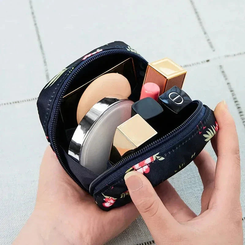 Portable Sanitary Napkin and Cosmetic Storage Bag in Tibetan Unicorn design, with a compact, folding design and contemporary pattern