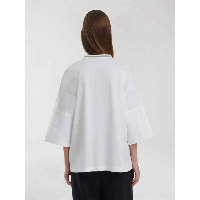 Stylish bead-embellished split-hem t-shirt in white, designed for the modern British woman with a touch of elegance and comfort.