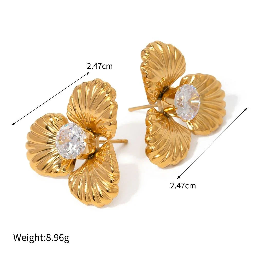 Elegant 18K gold-plated stainless steel flower stud earrings with sparkling zircon inlays, designed for timeless style and all-day comfort.
