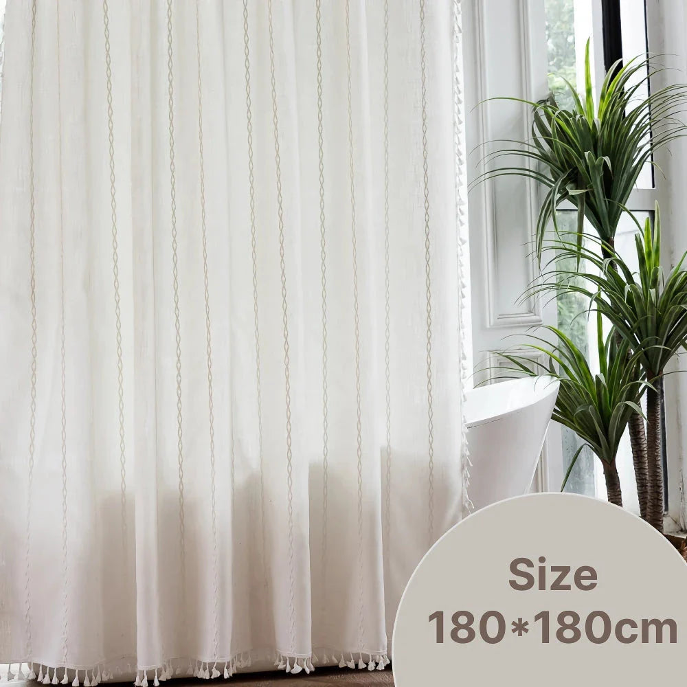 Premium bohemian tassel shower curtain with unique stitching design, waterproof coating, and durable linen blend material for a relaxing bathroom oasis