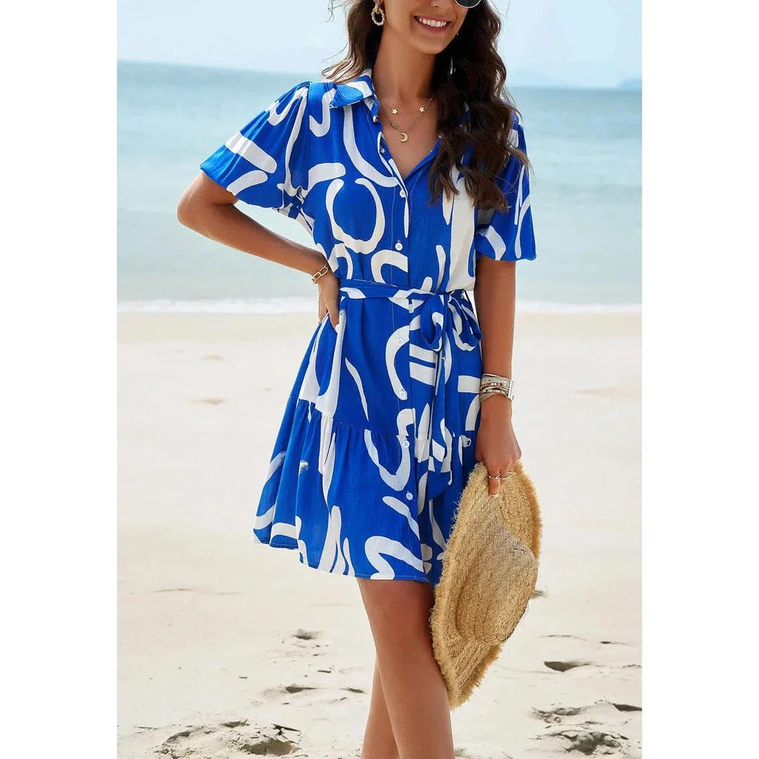 Elegant Geometric Print Mini Dress in Khaki with A-Line Silhouette and V-Neckline