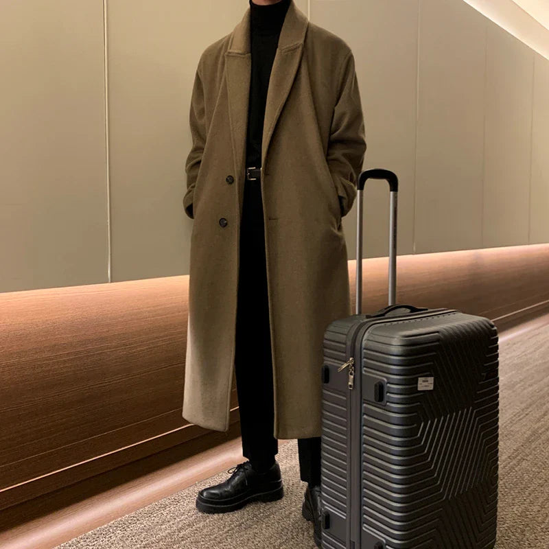 Premium British knee-length trench coat in classic black, featuring a relaxed, comfortable fit and made from a durable polyester-viscose blend.