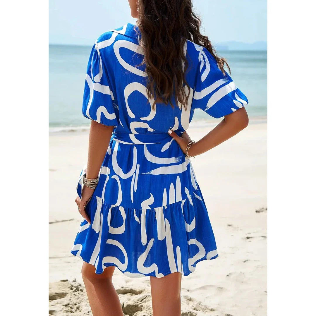 Elegant Geometric Print Mini Dress in Khaki with A-Line Silhouette and V-Neckline