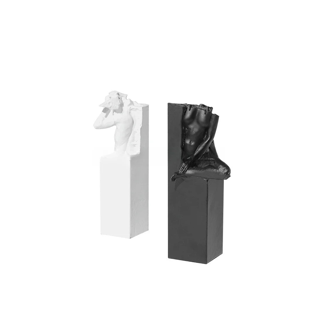 Elegant abstract sculpture in black and white, a minimalist desktop ornament that adds modern art decor to any space