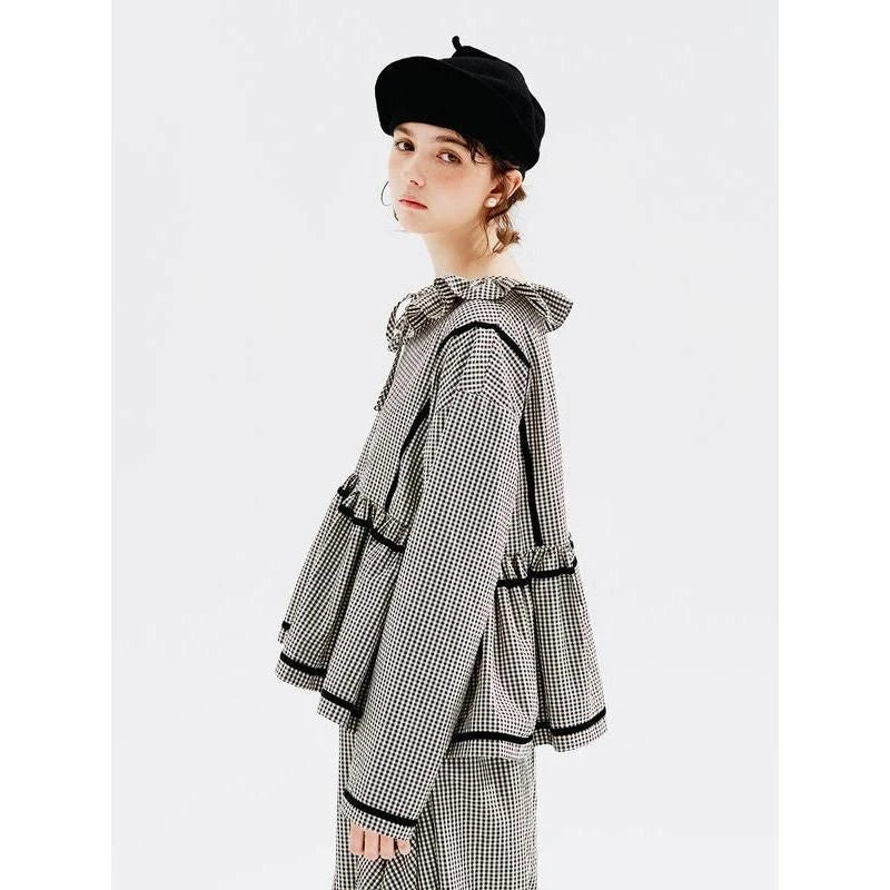 Autumn Elegance Checkered Shirt with Doll Collar, a stylish long-sleeved shirt in a classic black and white checkered pattern