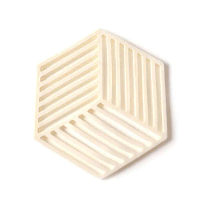 Geometric pattern cup coasters in a minimalist British design, made from durable rubber to protect surfaces
