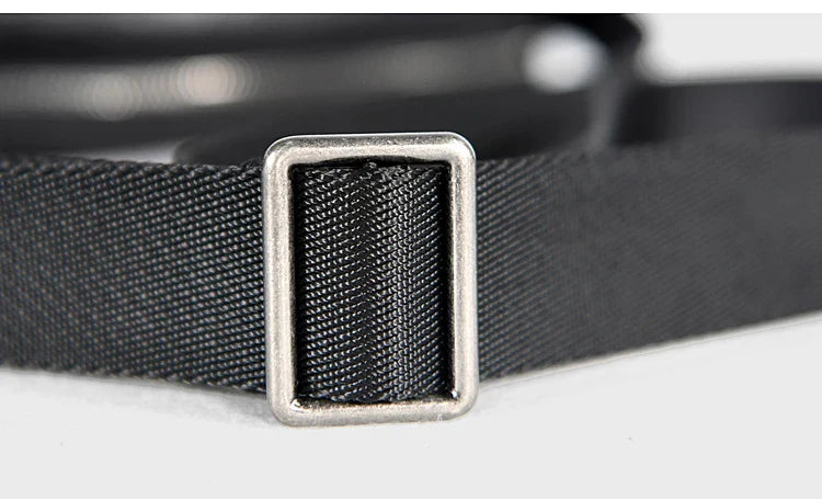 A premium British leather shoulder bag with a sleek, minimalist design and adjustable strap