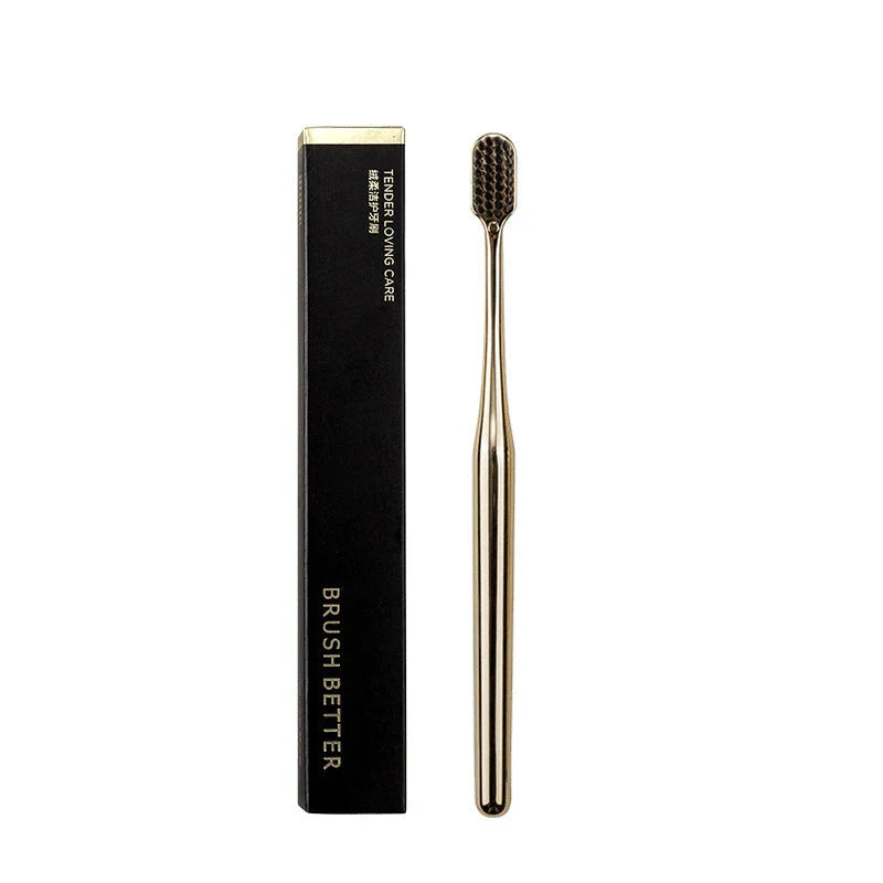 Elegant gold and silver toothbrush with soft bristles for superior dental hygiene