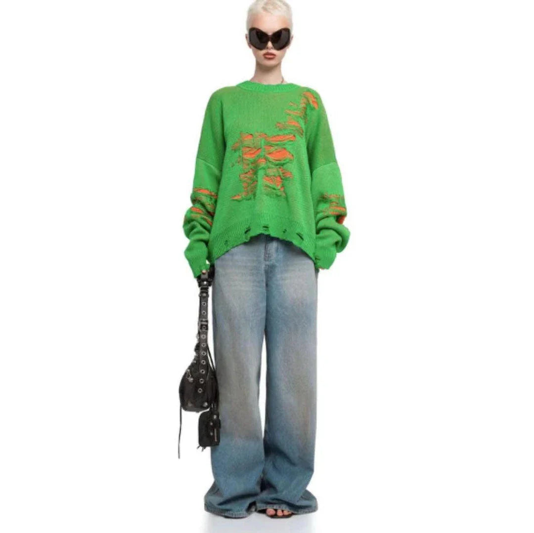 A stylish ripped long sleeve top in a variety of versatile colours, including grey, green, and black.