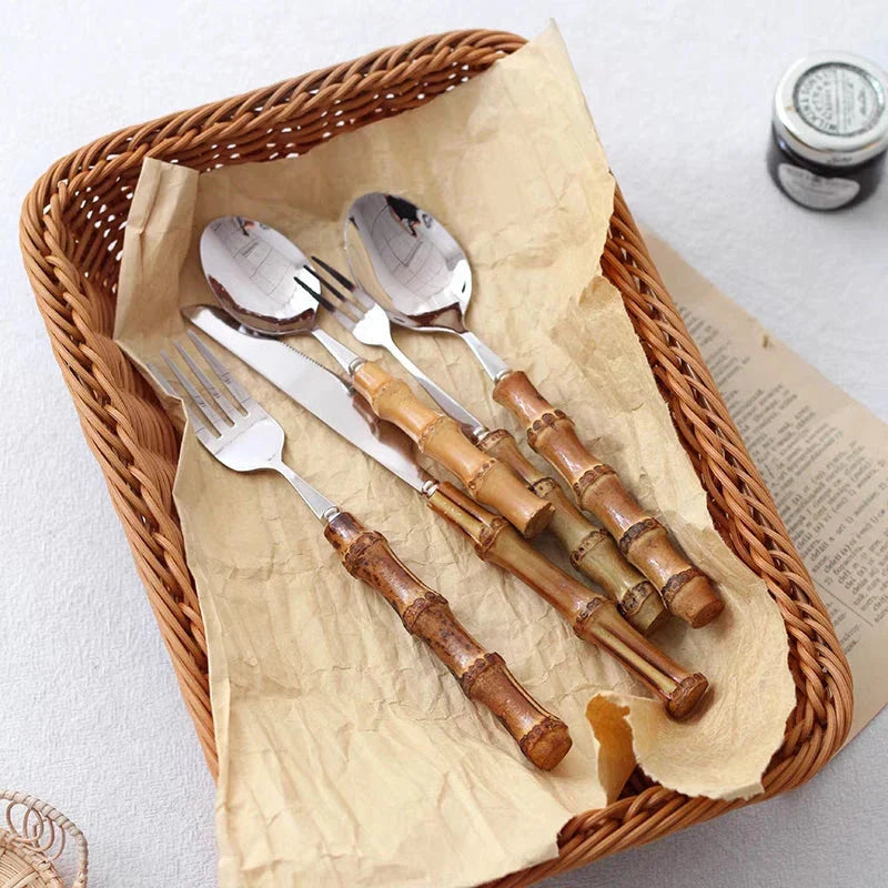 Mirror finish stainless steel cutlery set with bamboo handles, designed for elegant dining experiences