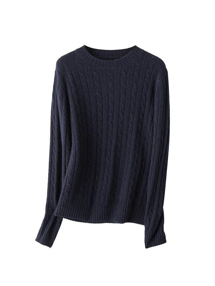 A luxurious 100% British wool cable knit jumper in a rich camel colour, perfect for keeping warm during the UK's chilly winters.
