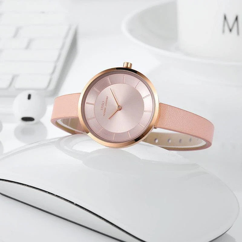 Stylish slim ladies' waterproof watch in various colours, including black, tan, grey, and white, with rose gold or silver accents.