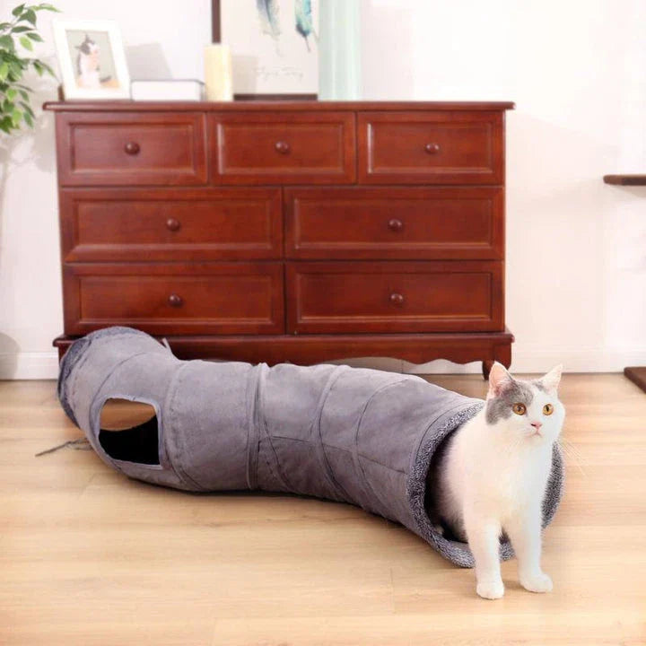 Grey foldable cat play tunnel with crinkle sounds, peek-a-boo holes, and a hanging ball toy for interactive playtime