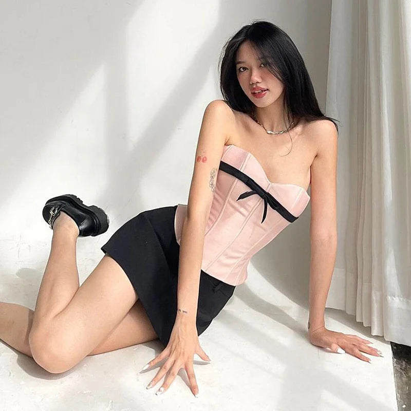 Stylish bow-accented waist back fashion in pink, made with premium polyester for a comfortable and flattering fit.