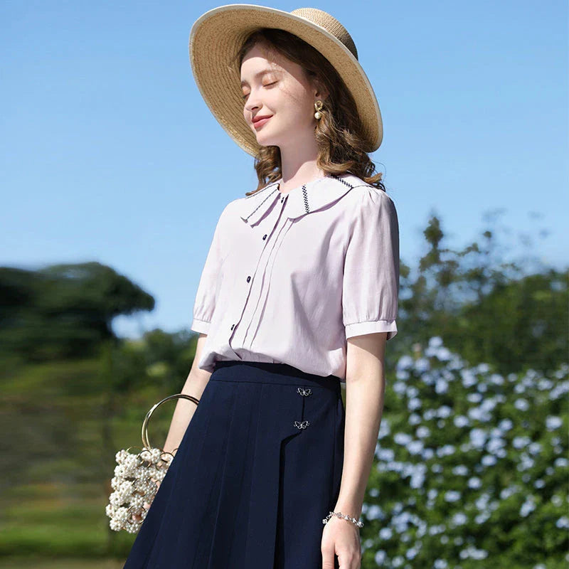 Elegant French puff sleeve blouse with timeless Peter Pan collar, available in purple and various sizes