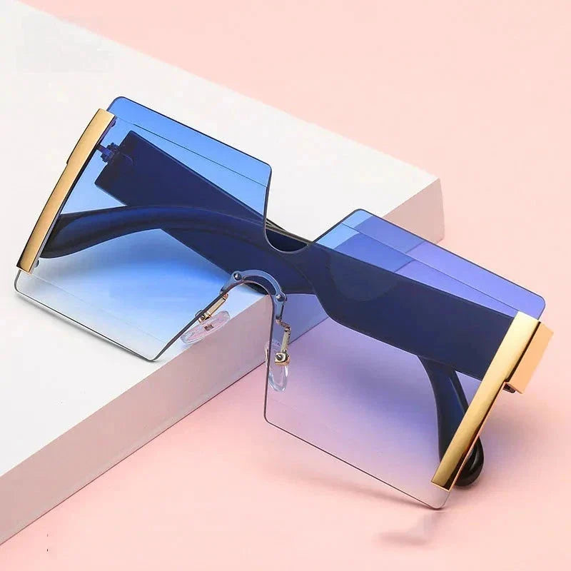 Stylish rimless gradient square sunglasses for women, featuring a bold and versatile design with gradient lenses for enhanced privacy and sun protection.