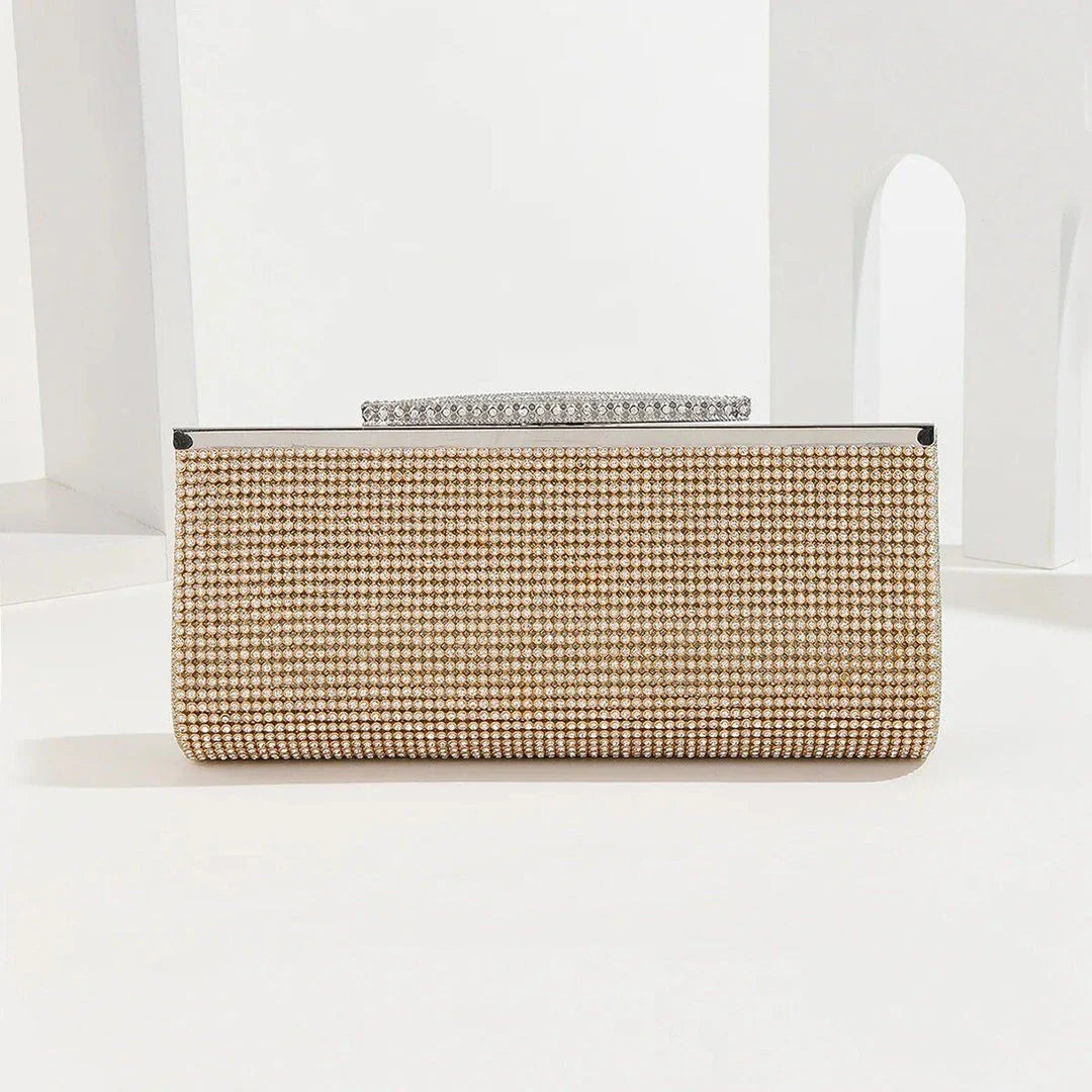 Glamorous gold rhinestone evening clutch with elegant chain and diamond decorations, perfect for UK special occasions