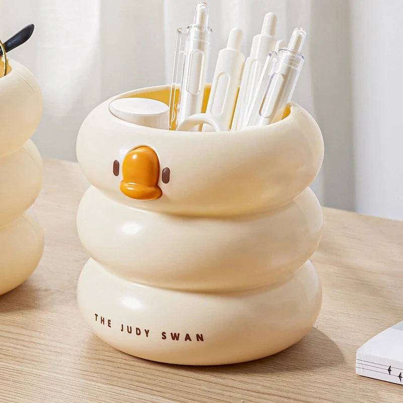 Stylish cartoon desk organiser with spacious circular design and cute cartoon motif for storing pens, pencils, and other desk essentials